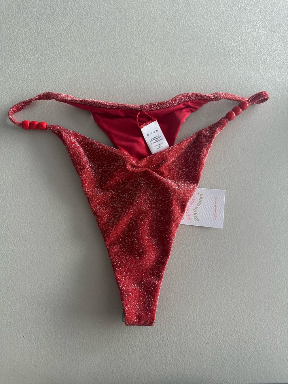 Sparkling Red dipping daisy’s Fiji bikini bottom
